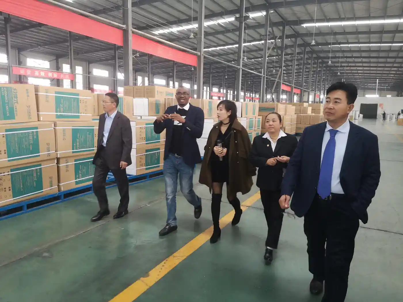 International customers touring Cassky's finished-product warehouse