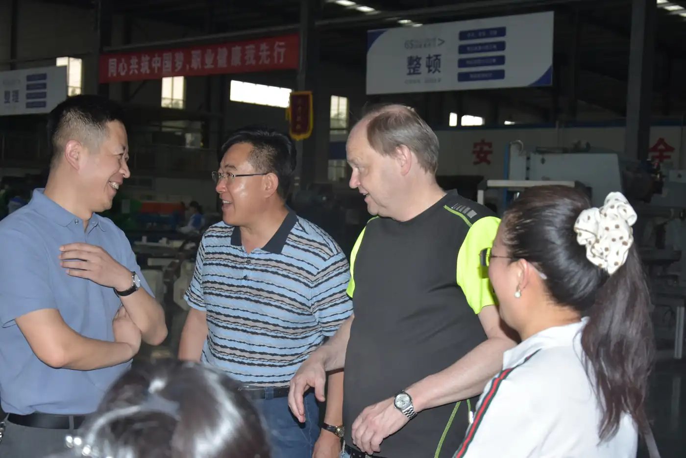 Swedish customer discussing manufacturing details with the Cassky team on the factory floor
